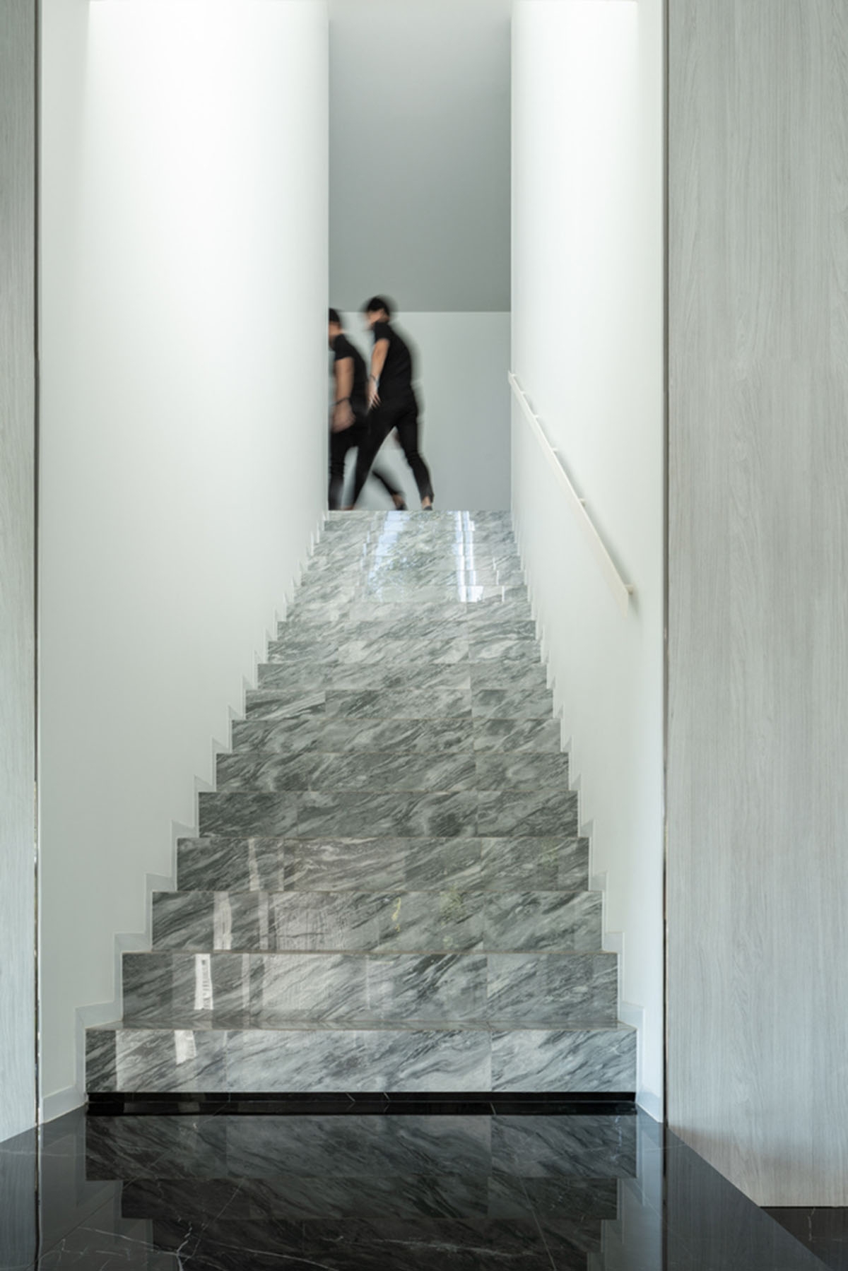 AAd built self-sustainable residence with perforated facade and steel rods in Thailand