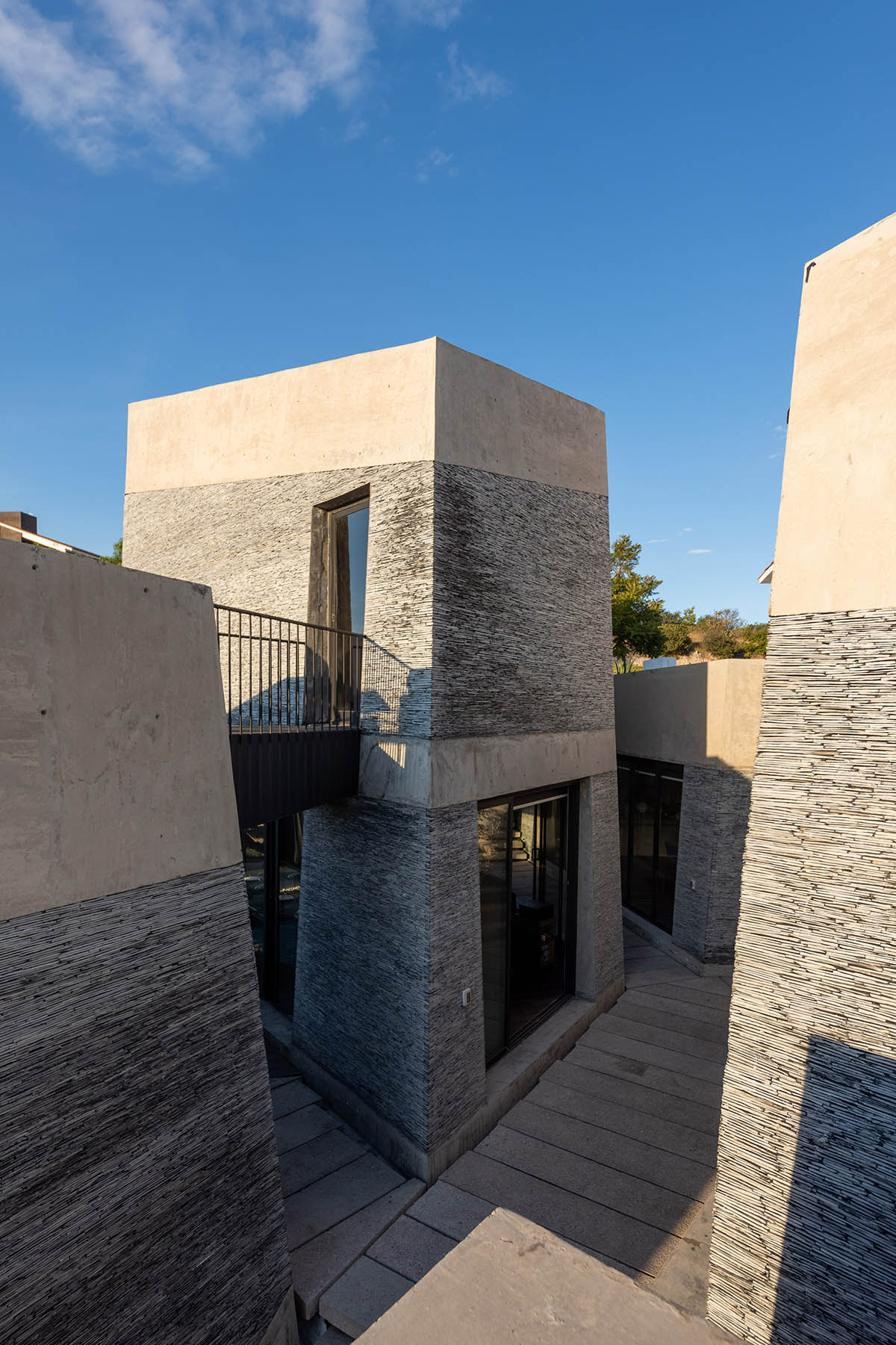 Rojkind Arquitectos completes weekend retreat with five prismatic volumes in Hidalgo, Mexico