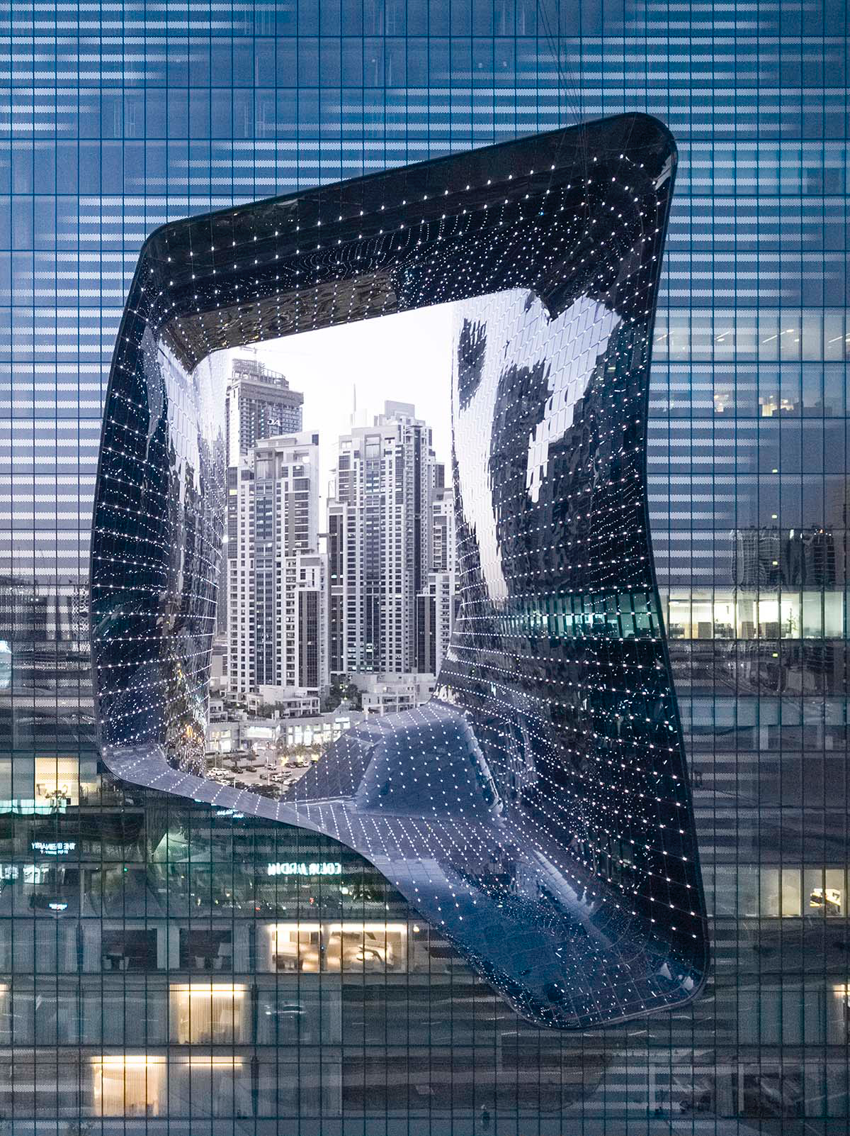 Zaha Hadid Architects' Opus Hotel in Dubai recaptured in photographs by Laurian Ghinitoiu