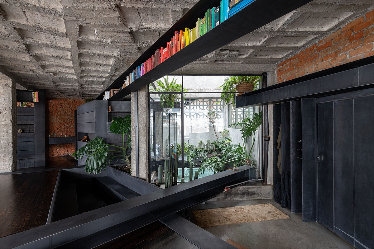 Aquiles Jarrín creates tropical interior in a Quito apartment featuring various layers of materials