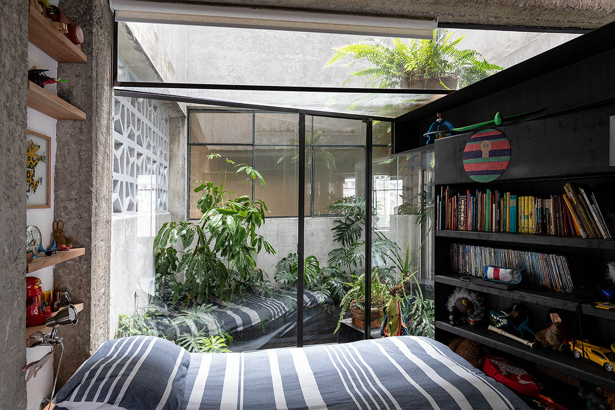 Aquiles Jarrín creates tropical interior in a Quito apartment featuring various layers of materials