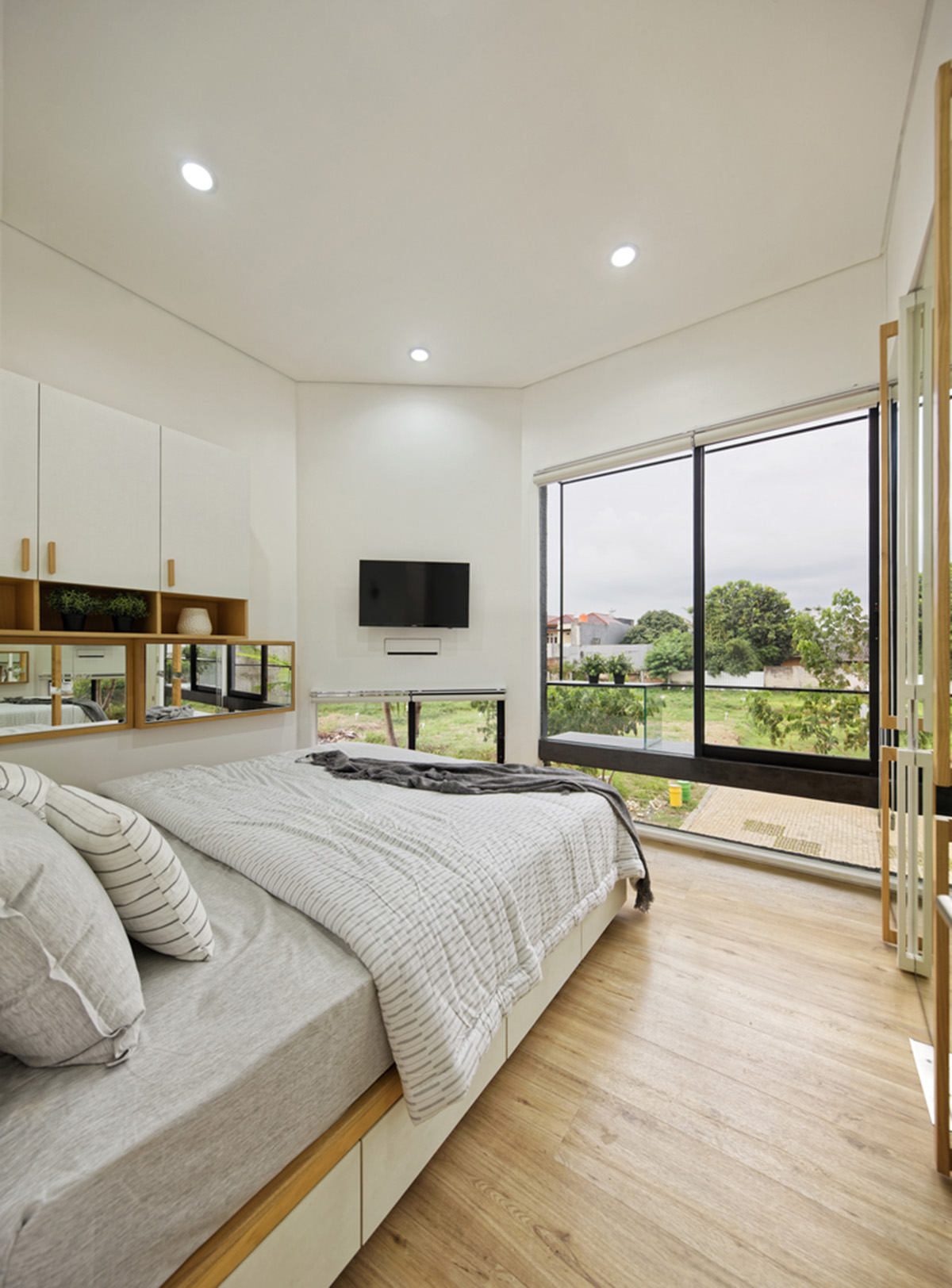 Delution designs a bold addition in a narrow plot in Indonesia