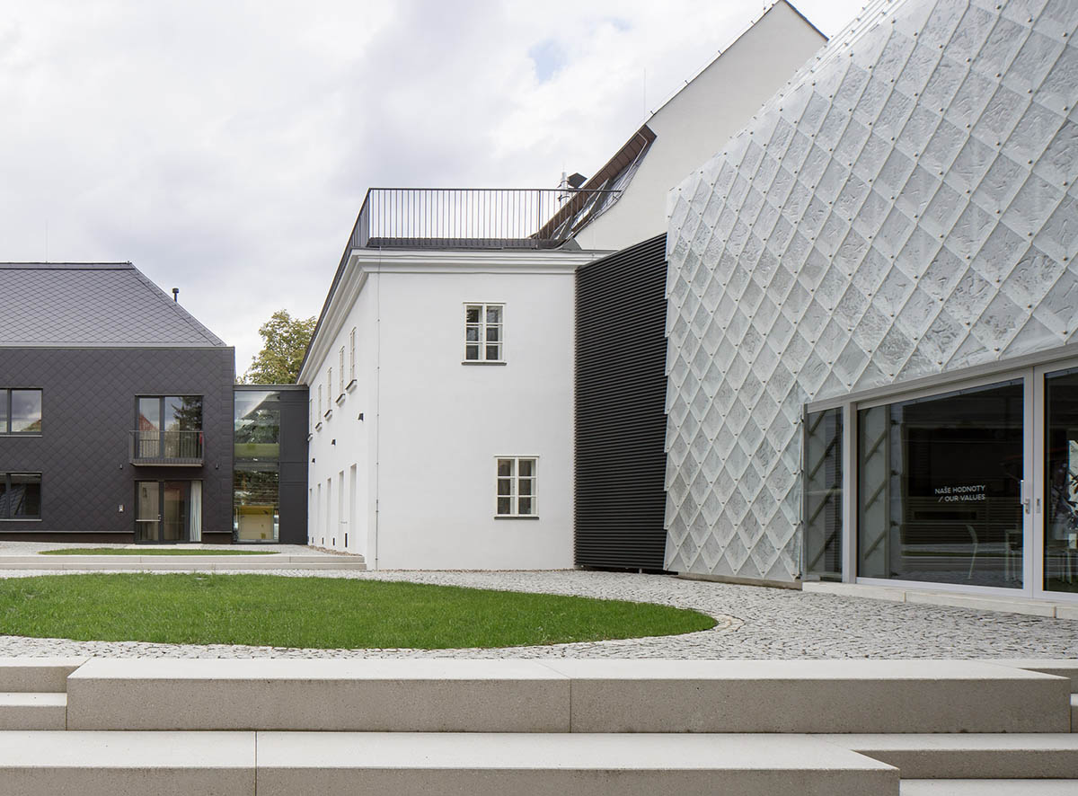 OV-A designs translucent Lasvit Headquarters reflecting glass making tradition of company in Nový Bor