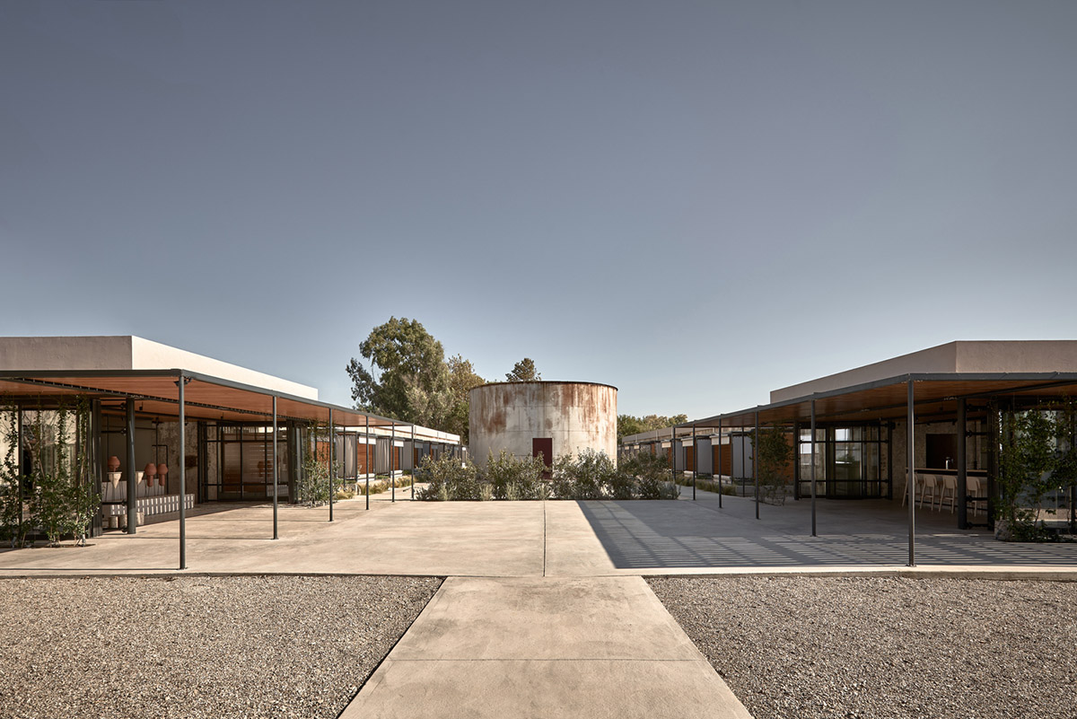 K-Studio converts historic winery complex into industrial-looking seaside hotel in Kourouta, Greece