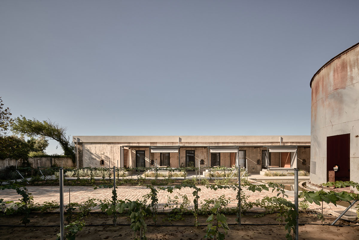 K-Studio converts historic winery complex into industrial-looking seaside hotel in Kourouta, Greece