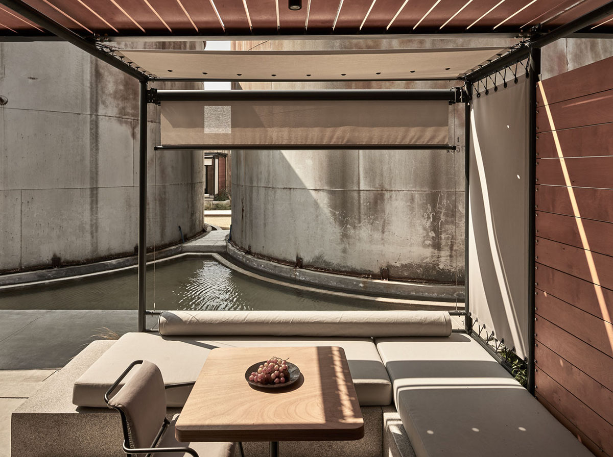 K-Studio converts historic winery complex into industrial-looking seaside hotel in Kourouta, Greece