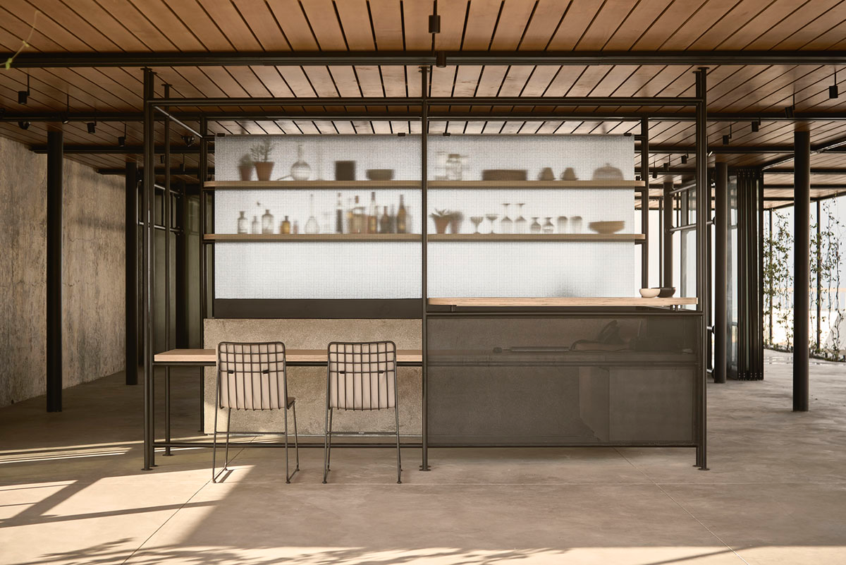 K-Studio converts historic winery complex into industrial-looking seaside hotel in Kourouta, Greece