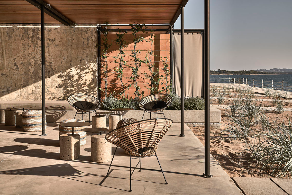 K-Studio converts historic winery complex into industrial-looking seaside hotel in Kourouta, Greece