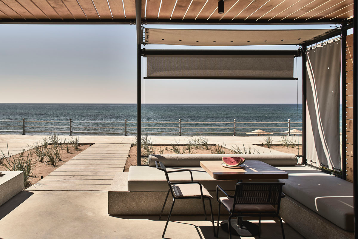 K-Studio converts historic winery complex into industrial-looking seaside hotel in Kourouta, Greece