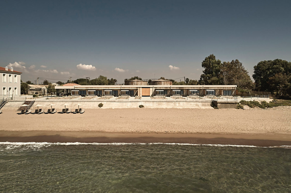 K-Studio converts historic winery complex into industrial-looking seaside hotel in Kourouta, Greece
