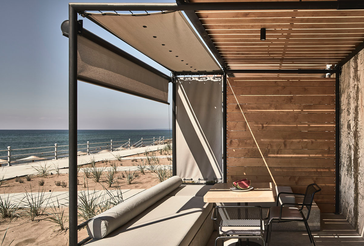 K-Studio converts historic winery complex into industrial-looking seaside hotel in Kourouta, Greece