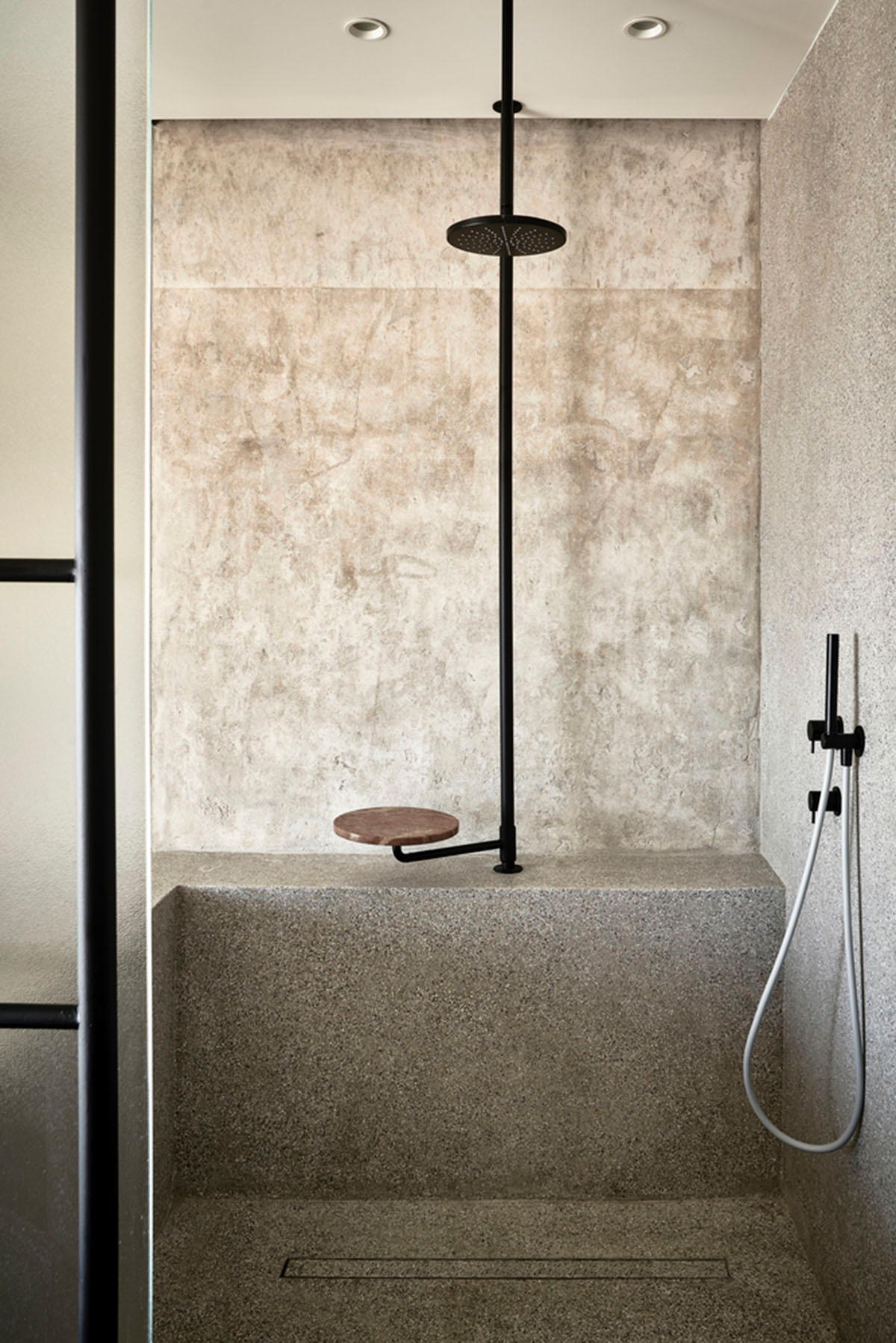 K-Studio converts historic winery complex into industrial-looking seaside hotel in Kourouta, Greece