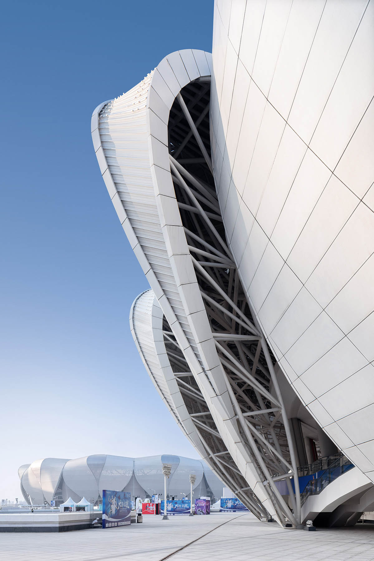 NBBJ forms sustainable olympic sports center inspired by lotus flower in Hangzhou