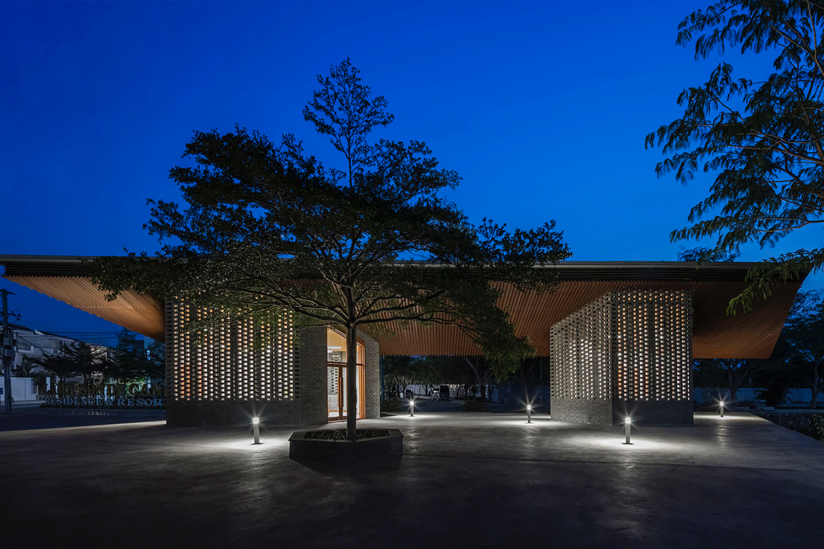 Hexagonal pavilions are hidden under V-shaped roofs that look like a pair of bird wings in Vietnam