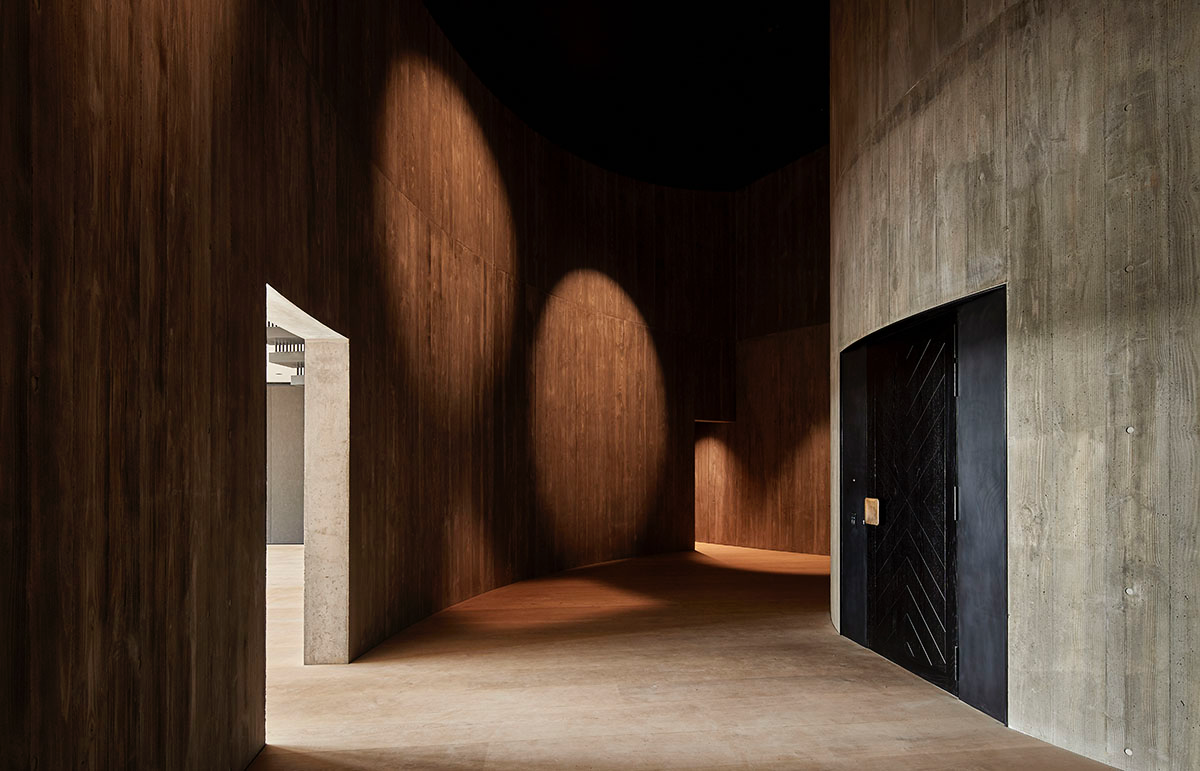 Wood Marsh built sculptural Towers Road House that features disc-shaped zinc roof in Toorak