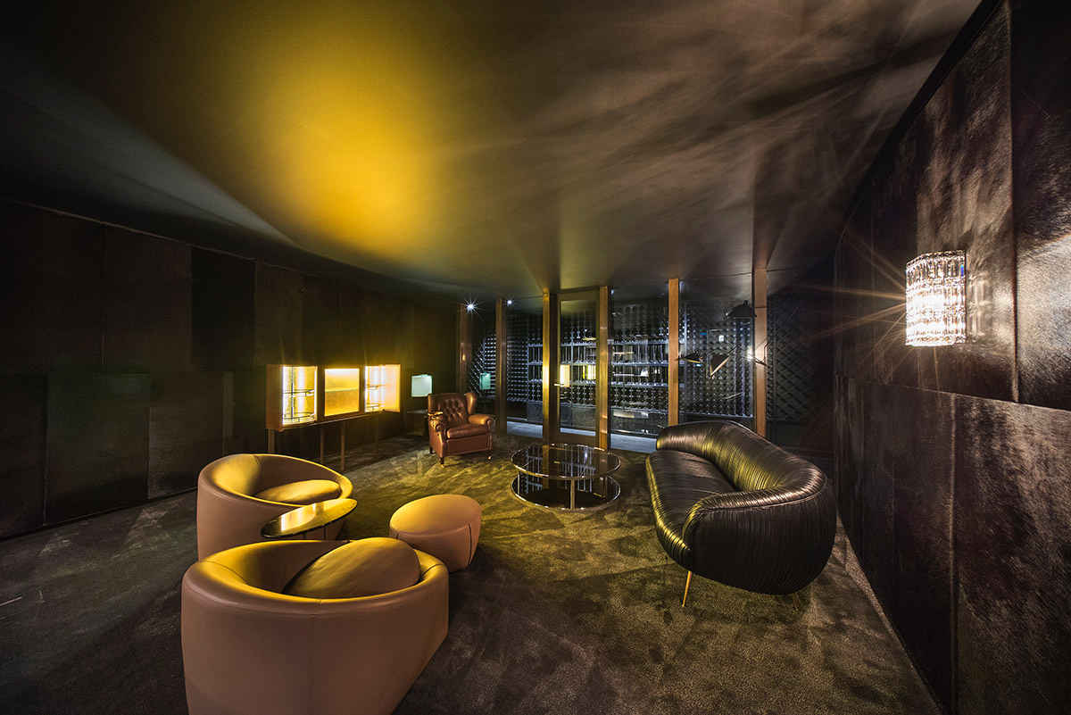 Wood Marsh built sculptural Towers Road House that features disc-shaped zinc roof in Toorak