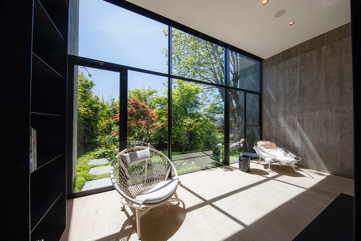 Wood Marsh built sculptural Towers Road House that features disc-shaped zinc roof in Toorak