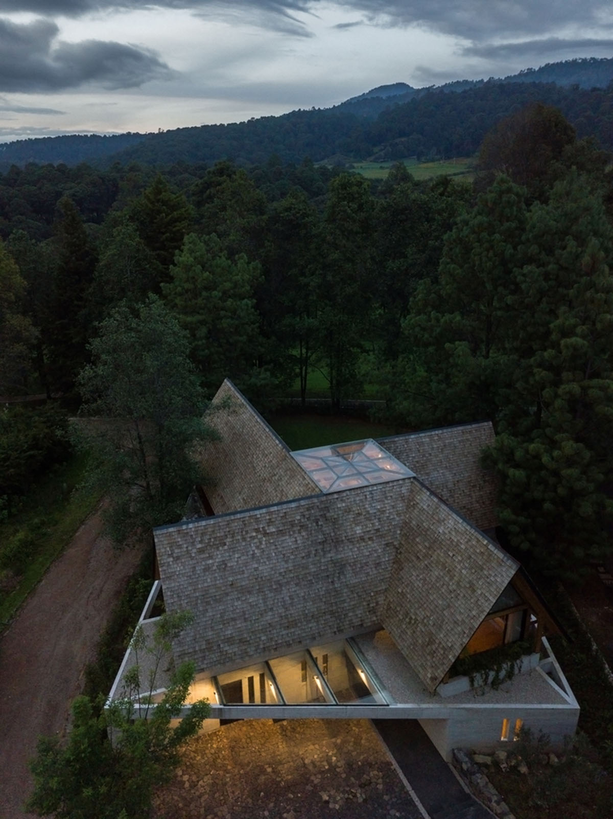 Estudio MMX designs club house creating diagonal landscaped spaces in Mexico