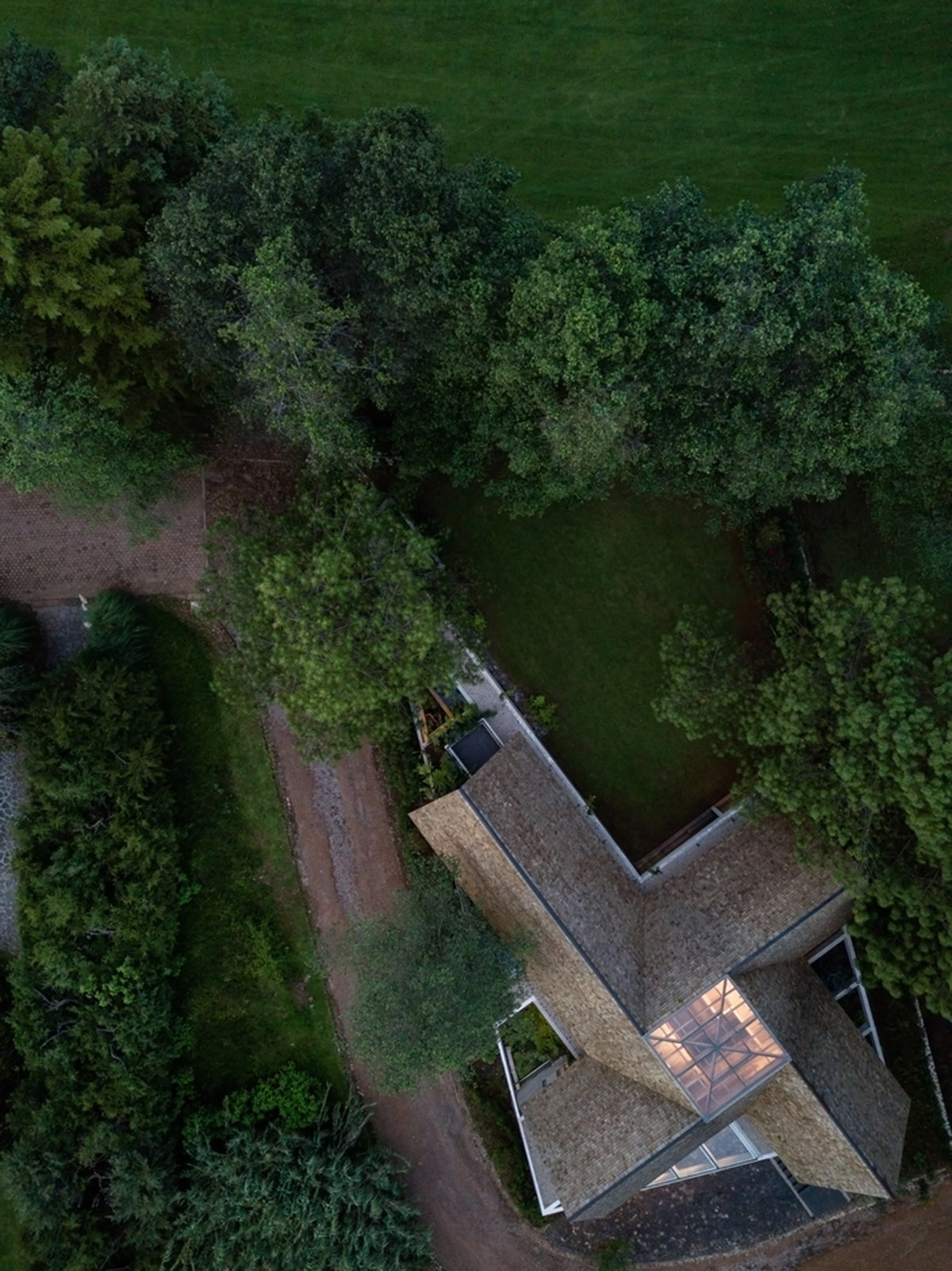 Estudio MMX designs club house creating diagonal landscaped spaces in Mexico