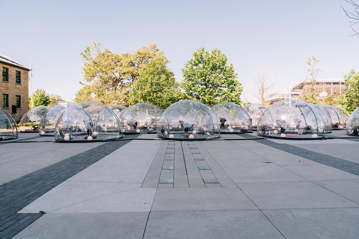 50 private geodesic domes guarantee social distancing measures for Yoga activity in Toronto streets