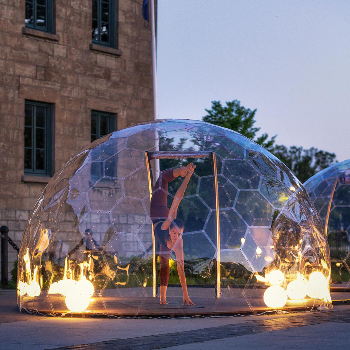 50 private geodesic domes guarantee social distancing measures for Yoga activity in Toronto streets
