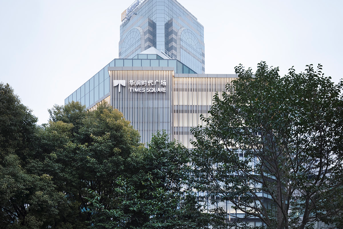 Nendo revives old Shanghai Times Square with aluminum screen that percolates on the facade