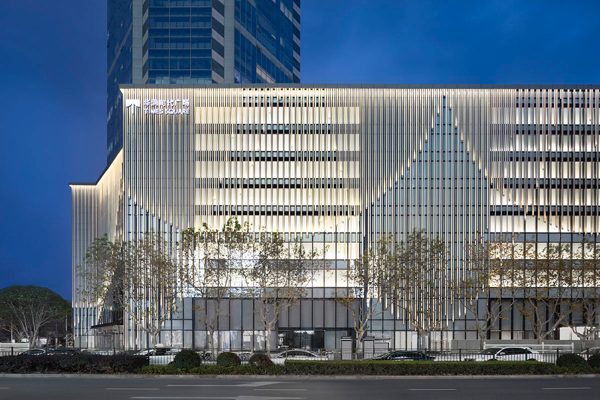 Nendo revives old Shanghai Times Square with aluminum screen that percolates on the facade