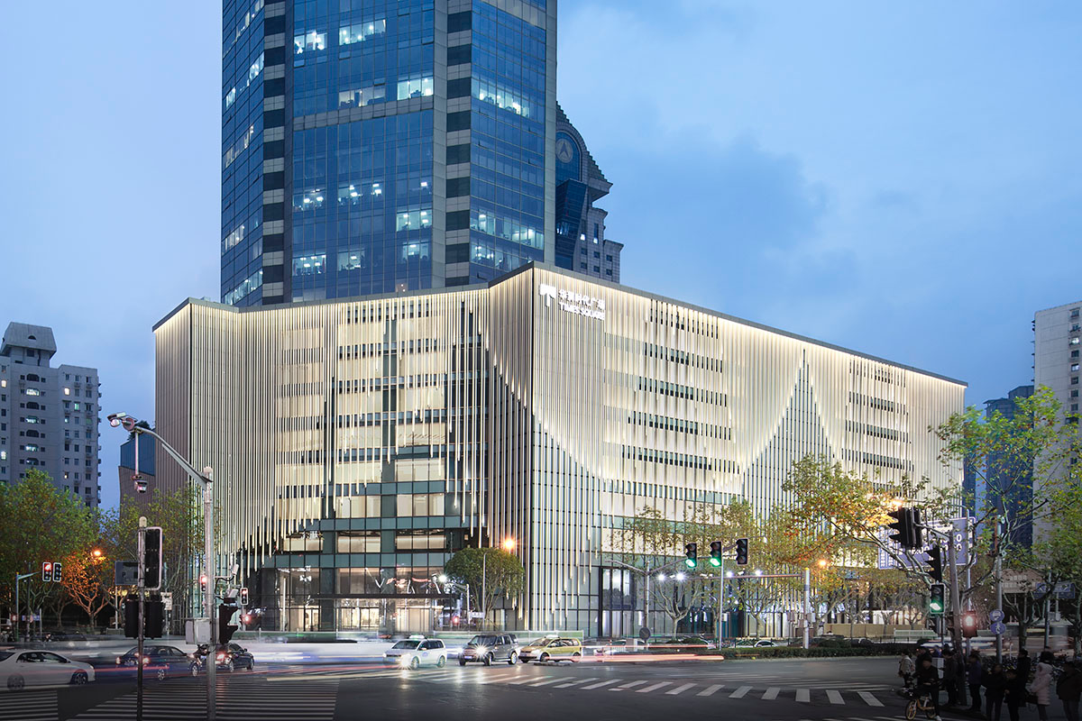 Nendo revives old Shanghai Times Square with aluminum screen that percolates on the facade