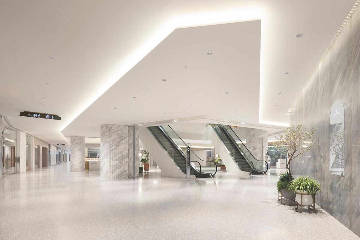 Nendo revives old Shanghai Times Square with aluminum screen that percolates on the facade