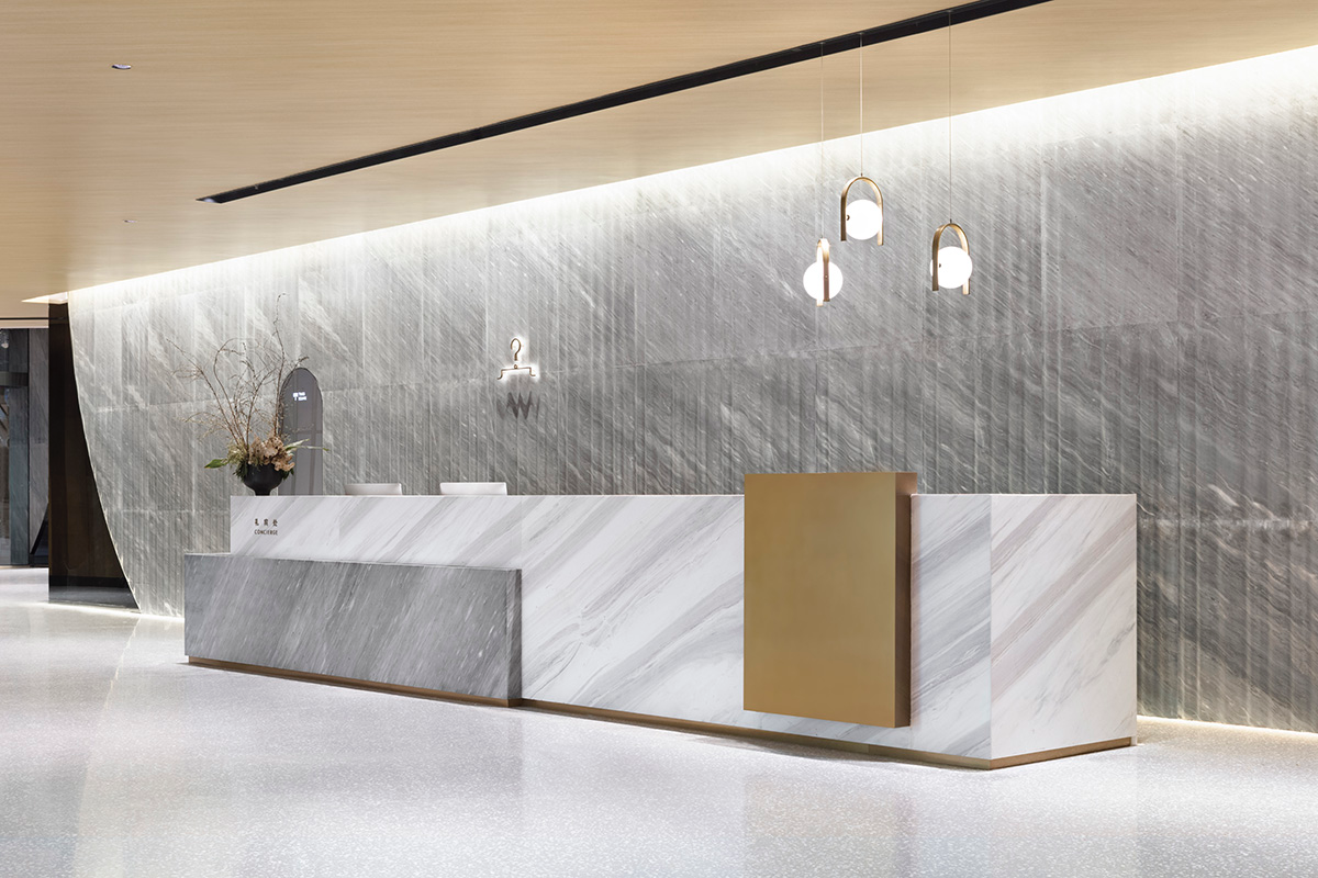 Nendo revives old Shanghai Times Square with aluminum screen that percolates on the facade