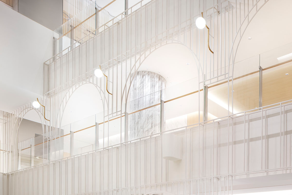 Nendo revives old Shanghai Times Square with aluminum screen that percolates on the facade