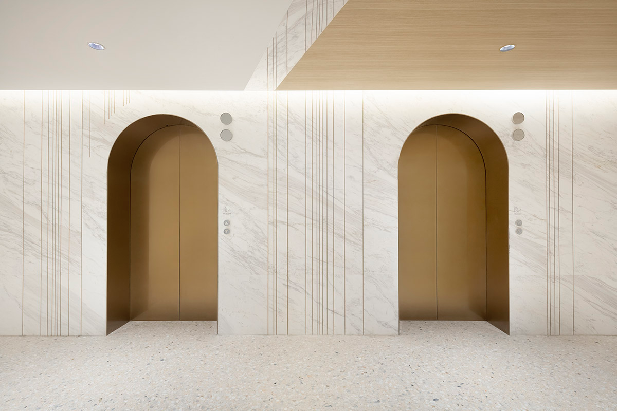 Nendo revives old Shanghai Times Square with aluminum screen that percolates on the facade