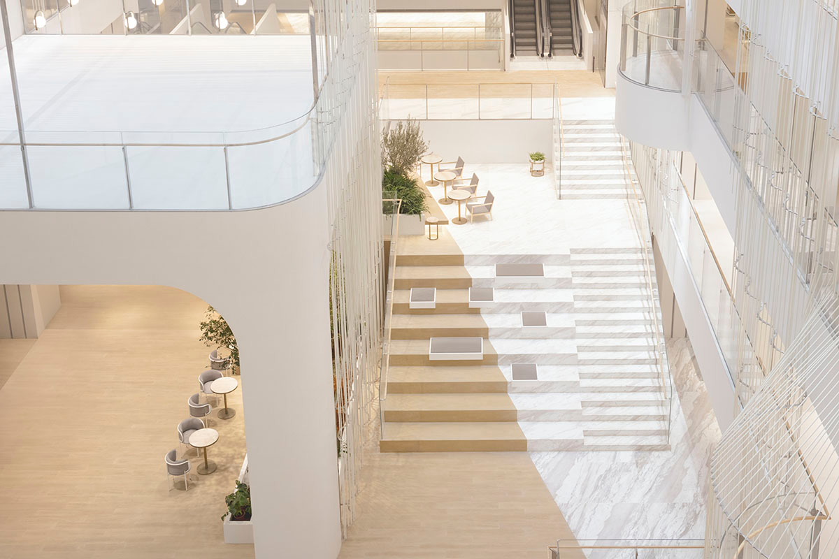Nendo revives old Shanghai Times Square with aluminum screen that percolates on the facade