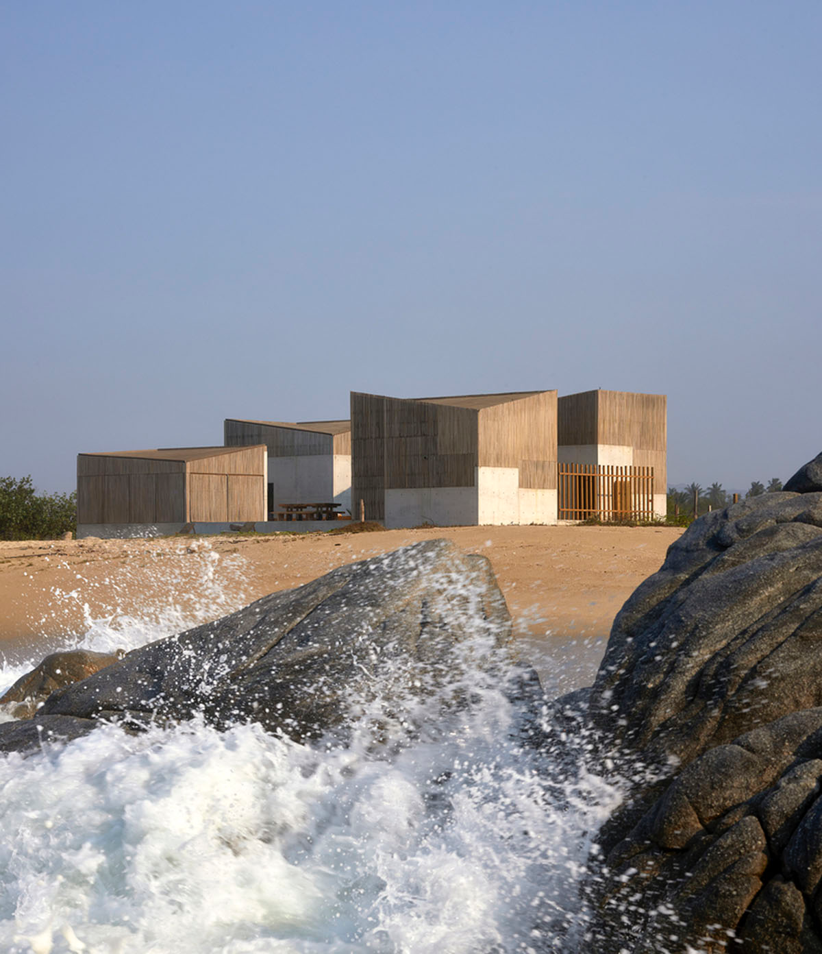 Four concrete and wooden volumes form Casa Naila paying tribute to Oaxaca’s rural architecture