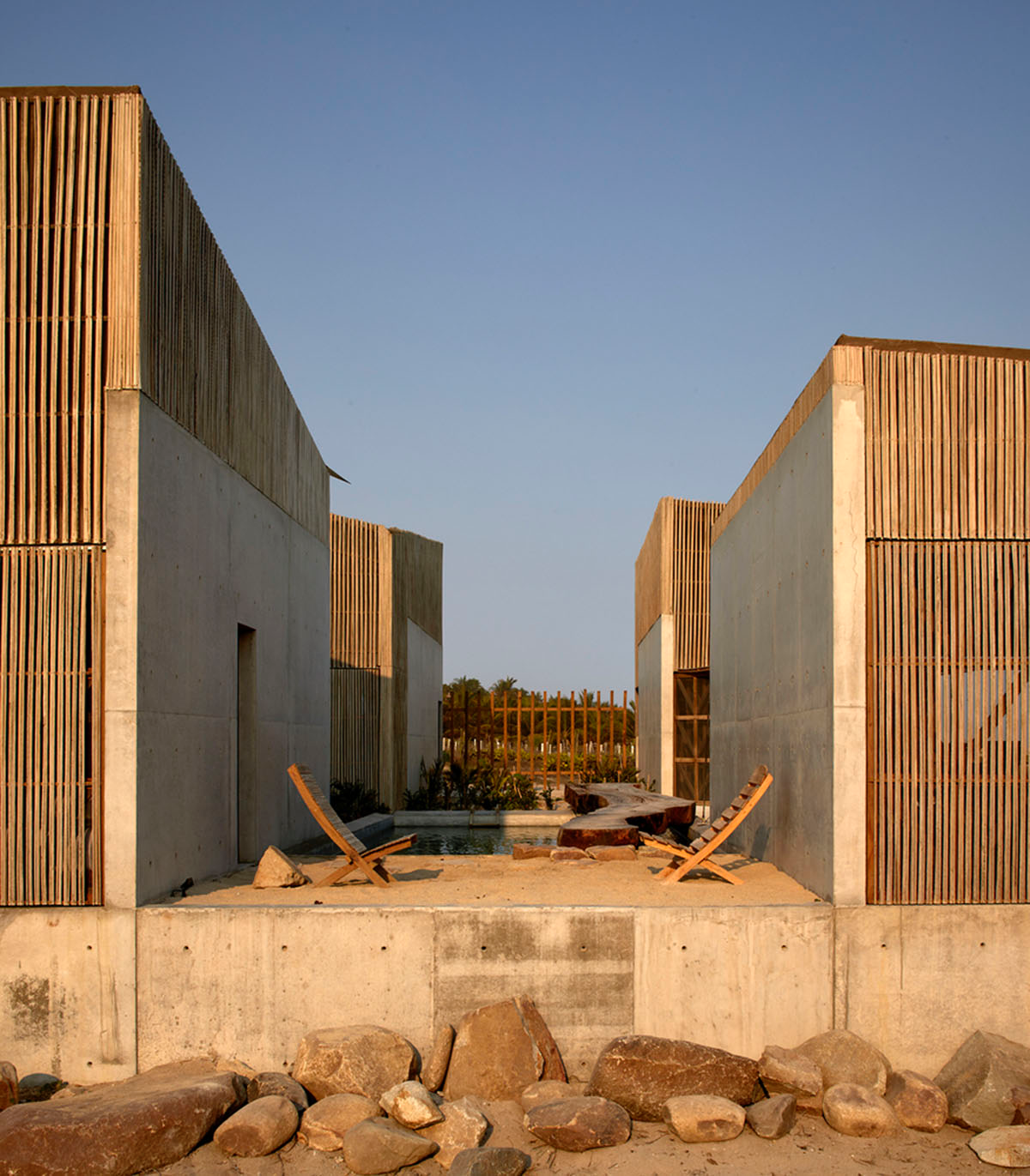 Four concrete and wooden volumes form Casa Naila paying tribute to Oaxaca’s rural architecture