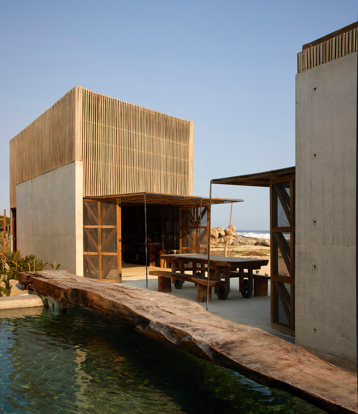 Four concrete and wooden volumes form Casa Naila paying tribute to Oaxaca’s rural architecture