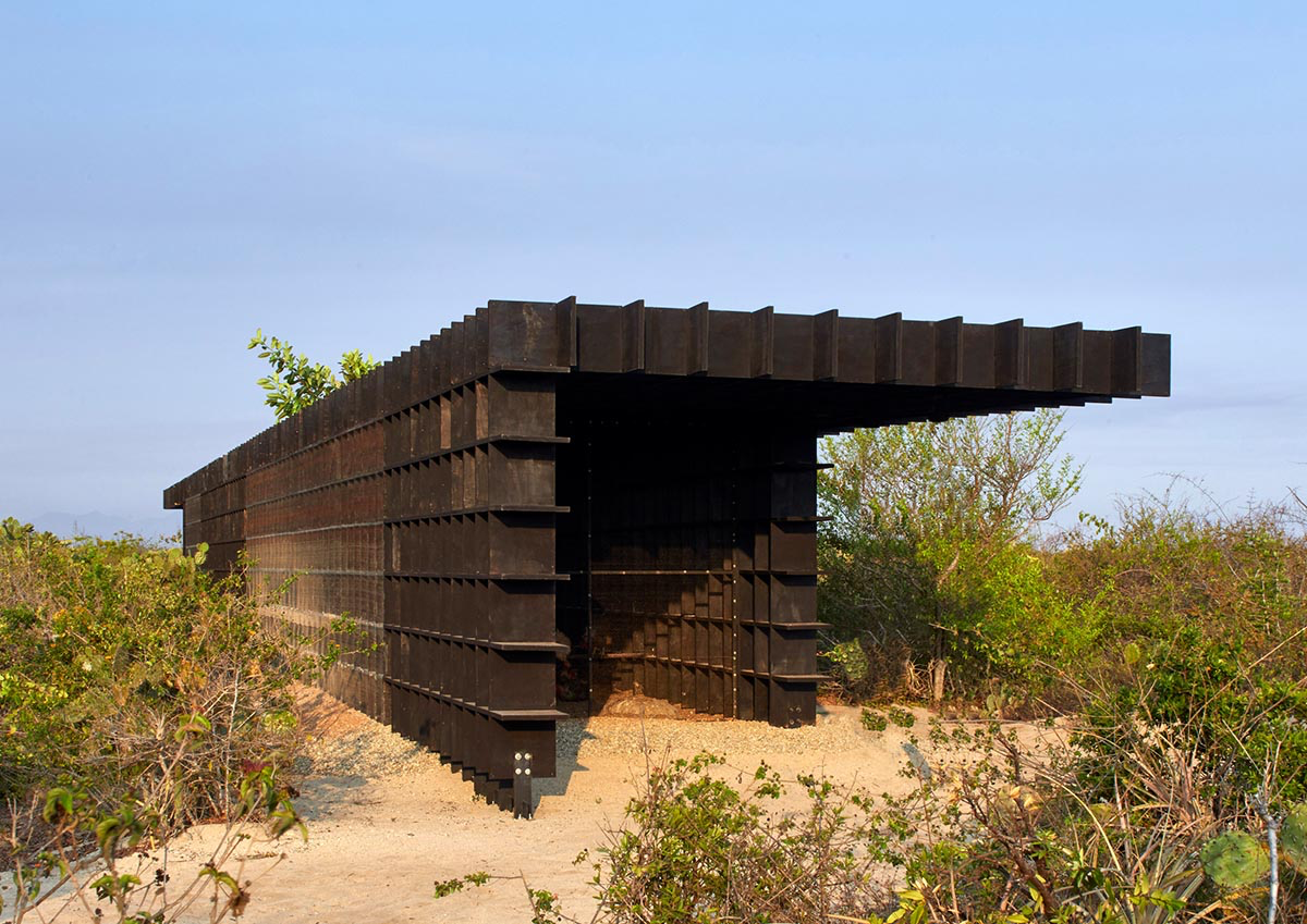 Kengo Kuma and Associates built chicken coop made of burnt wooden boards in Mexico