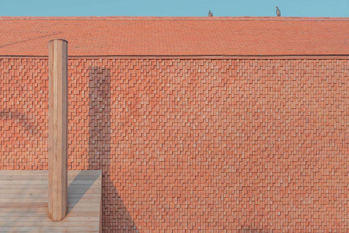 onion designs hotel and restaurant with handmade orange bricks in Thailand