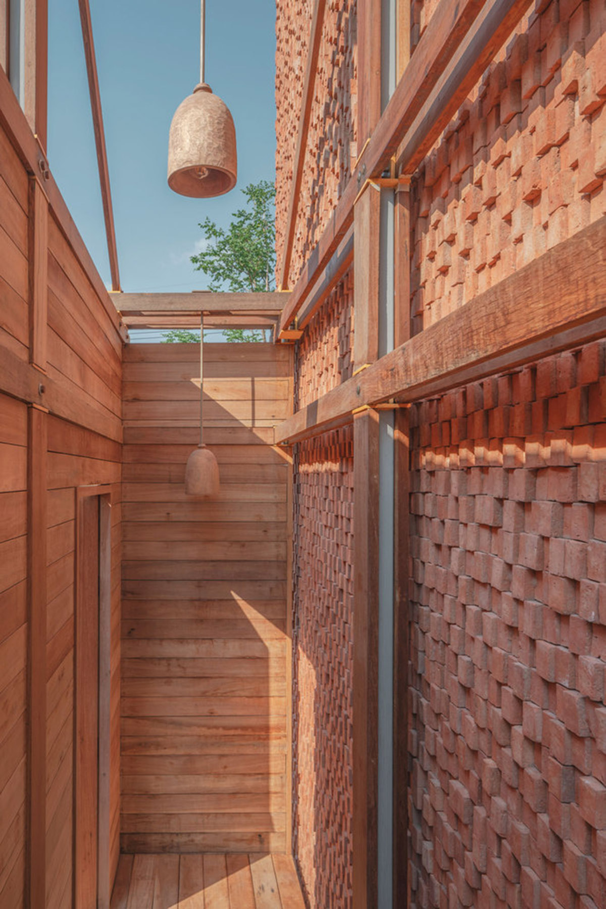 onion designs hotel and restaurant with handmade orange bricks in Thailand