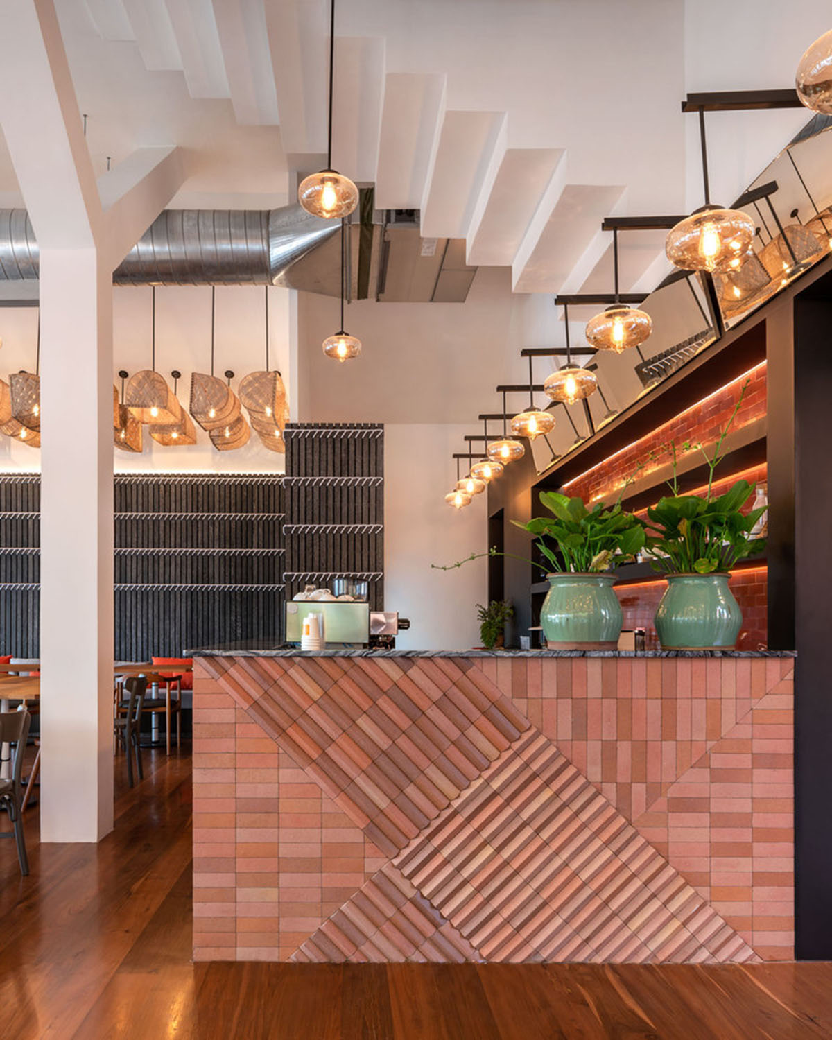 onion designs hotel and restaurant with handmade orange bricks in Thailand