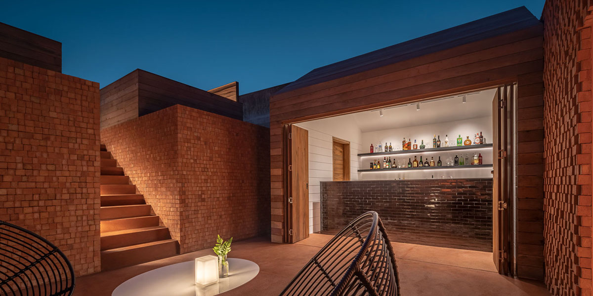 onion designs hotel and restaurant with handmade orange bricks in Thailand