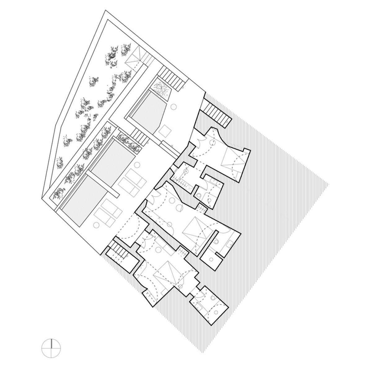 Kapsimalis Architects built castle-like hotel almost disappearing it on a steep hillside of Oia