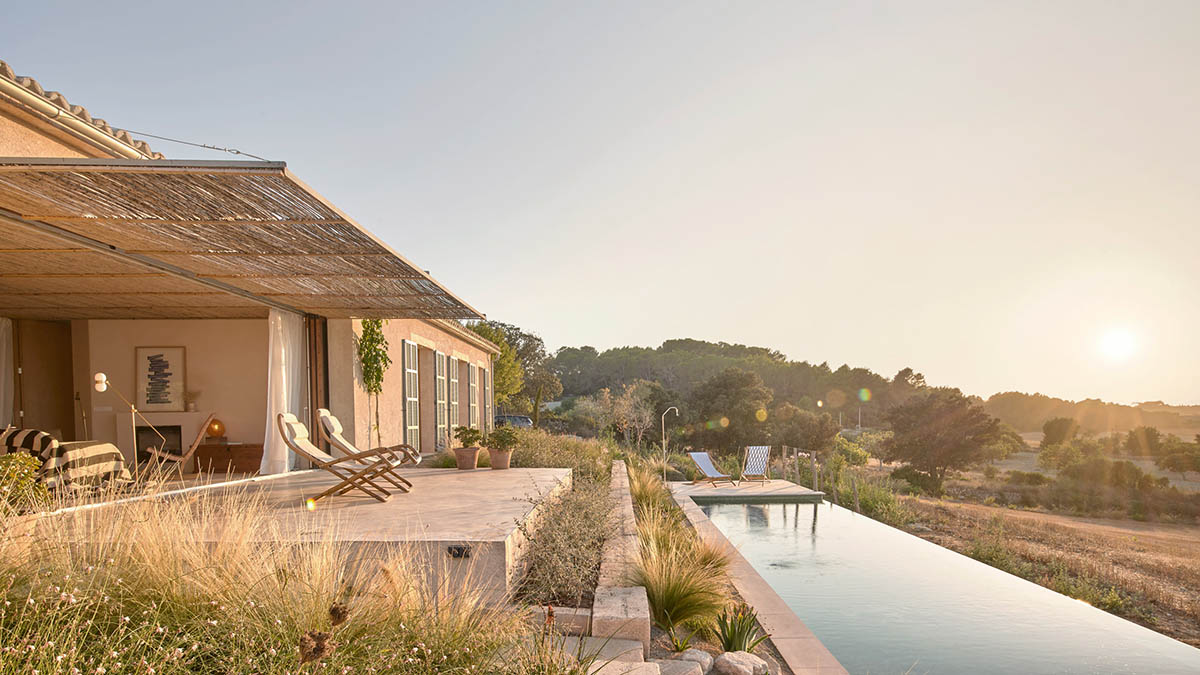 OHLAB's rural villa in Mallorca allows guests to frame natural surrounding under wattle pergola