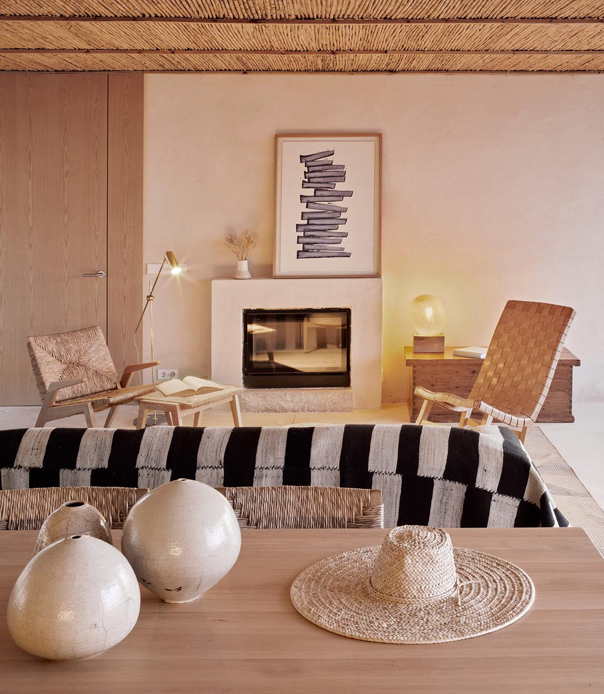 OHLAB's rural villa in Mallorca allows guests to frame natural surrounding under wattle pergola