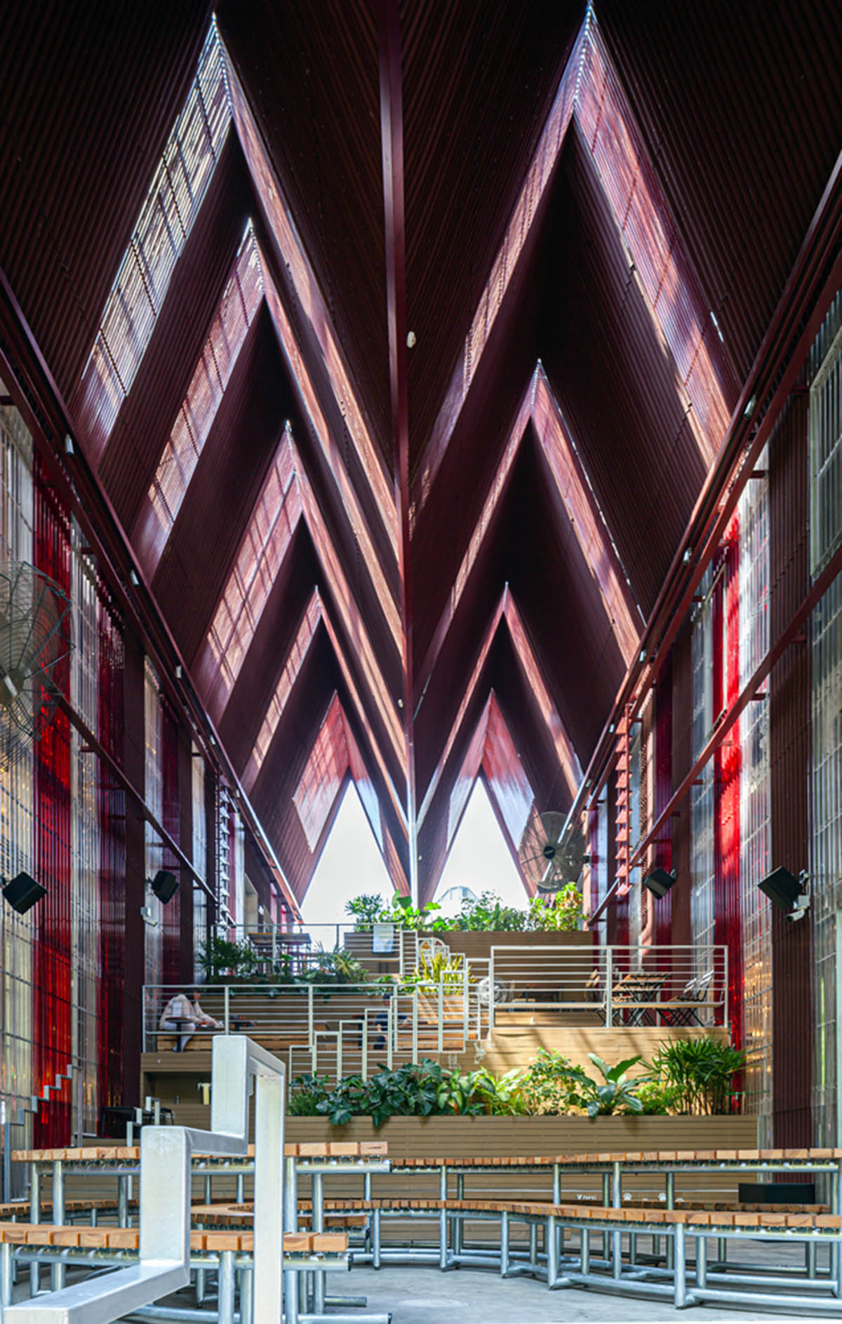 Department of ARCHITECTURE built pavilion with red transparent corrugated sheets for its roof