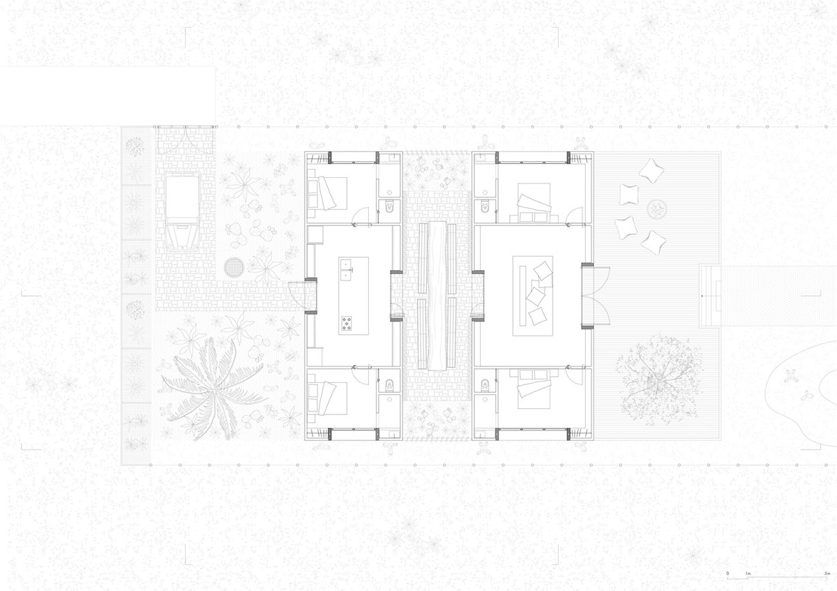 Two identical all-white volumes form this house by Atelier Branco Arquitetura on a flat landscape