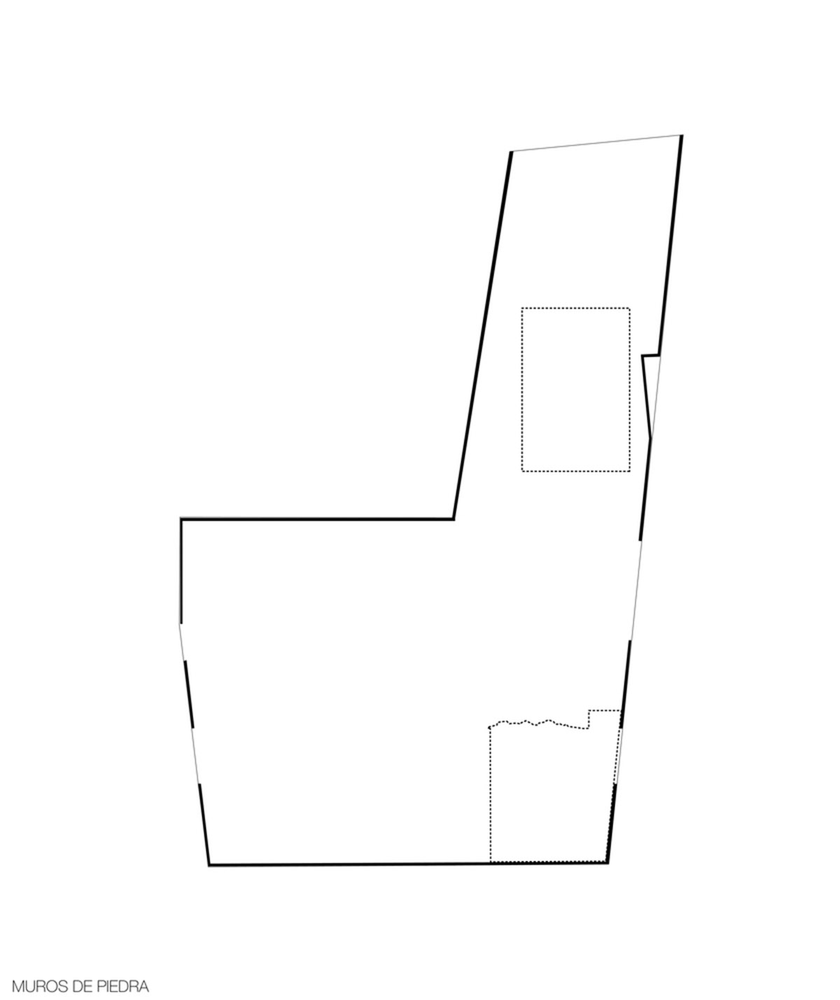 This gridded hotel made from pigmented concrete and volcanic stone sits on rugged terrain in Mexico