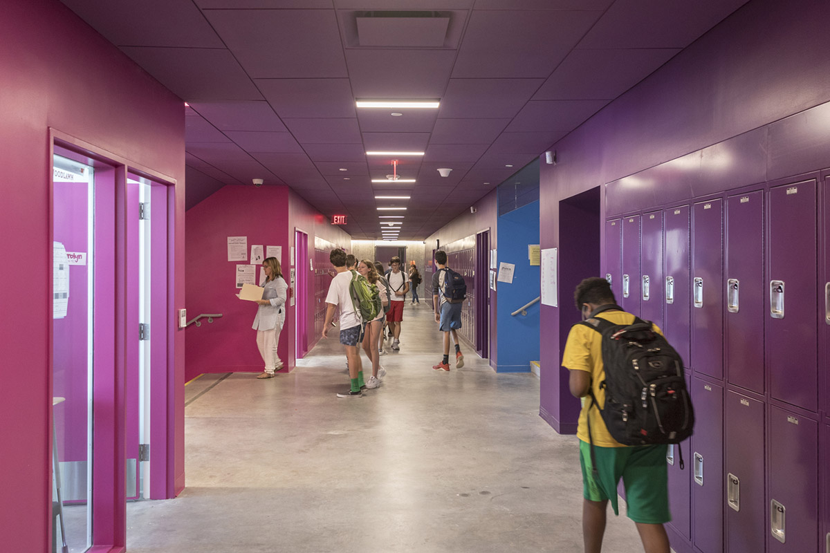 Five rectangular volumes rotating around a fixed pivot point form BIG-designed educational building