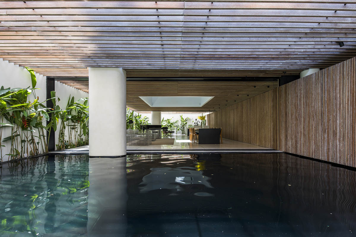 MIA Design Studio compensates the lack of green spaces of Vietnam with planted pop-up balconies