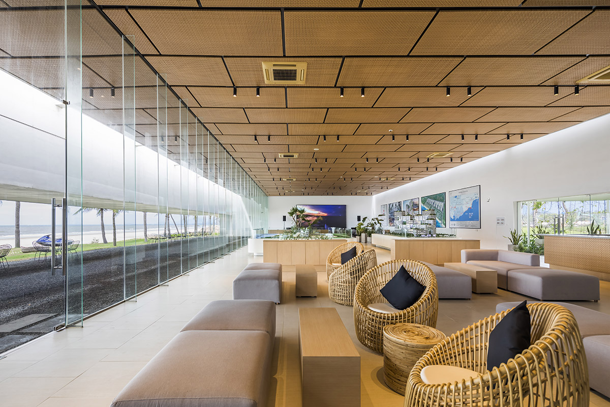 Six landscape boxes form this gallery and showroom by MIA Design Studio in Vietnam